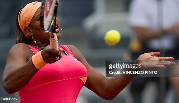Serena Williams returns a forehand to Switzerland's Timea Bacsinszky during their third round match of the WTA Rome Open on May 4, 2010 at the Foro...