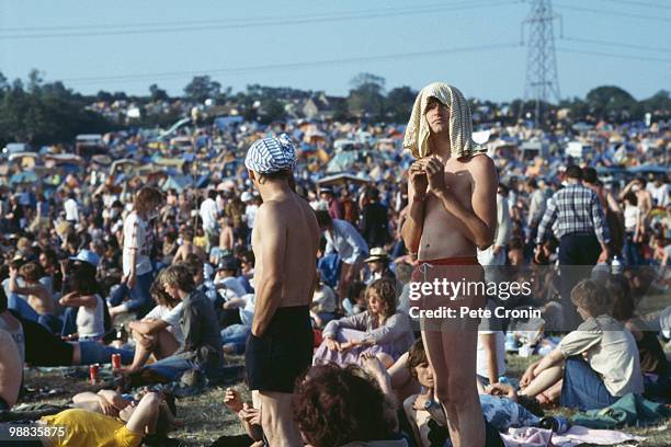 Audience members in front of the Pyramid stage at the Glastonbury Festival in June 1983.