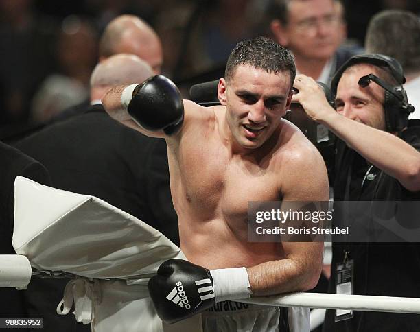 Karo Murat of Germany celebrates after winning the WBO Intercontinental Light Heavyweight title fight against Tommy Karpency of the U.S. At the...