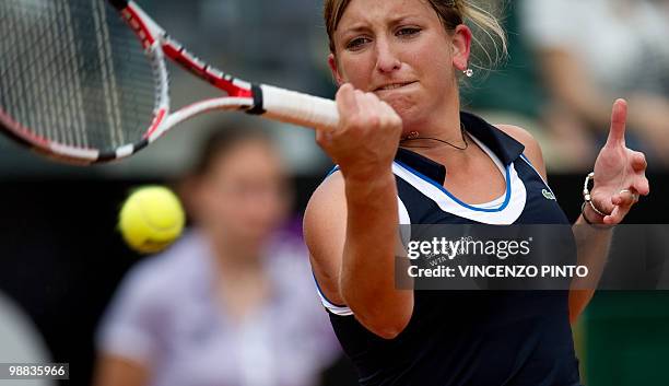 Switzerland's Timea Bacsinszky returns a forehand to US Serena Williams during their third round match of the WTA Rome Open on May 4, 2010 at the...