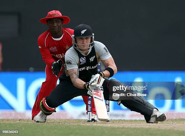 Brendon McCullum of New Zealand plays a scoop shot during the ICC T20 World Cup Group B match between New Zealand and Zimbabwe at the Guyana National...