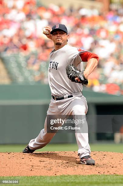 Josh Beckett of the Boston Red Sox pitches against the Baltimore Orioles at Camden Yards on May 2, 2010 in Baltimore, Maryland.