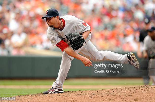 Josh Beckett of the Boston Red Sox pitches against the Baltimore Orioles at Camden Yards on May 2, 2010 in Baltimore, Maryland.