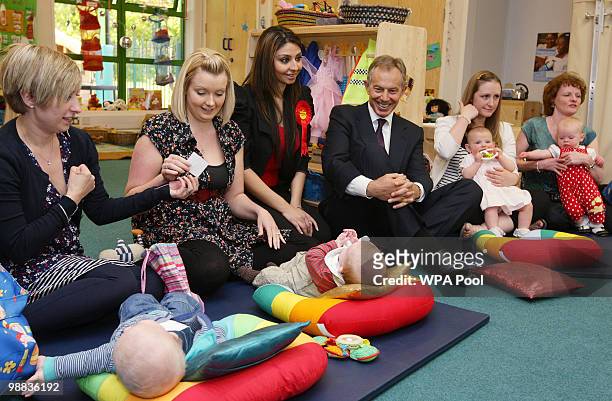 Former Prime Minister Tony Blair and candidate for Bury North, Maryam Khan meet parents and children during a visit to Woodbank with Elton Children's...