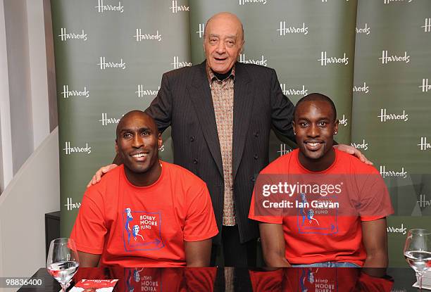 Sol Campbell, Mohammed Al Fayed and Carlton Cole attend a photocall to launch an exclusive ipod range in aid of the Bobby Moore Fund for Cancer...