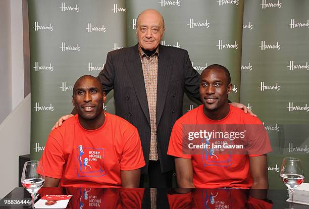 Sol Campbell, Mohammed Al Fayed and Carlton Cole attend a photocall to launch an exclusive ipod range in aid of the Bobby Moore Fund for Cancer...