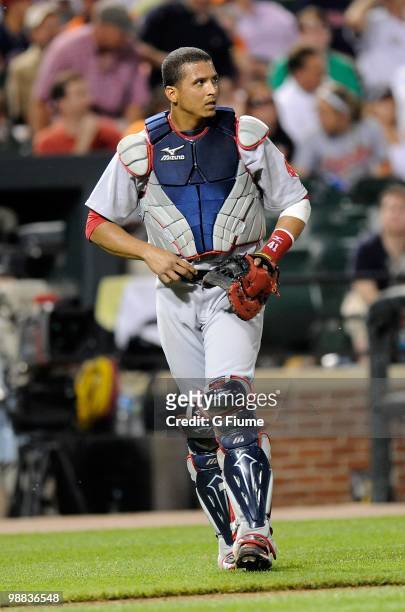 Victor Martinez of the Boston Red Sox walks towards home plate during the game against the Baltimore Orioles at Camden Yards on May 1, 2010 in...