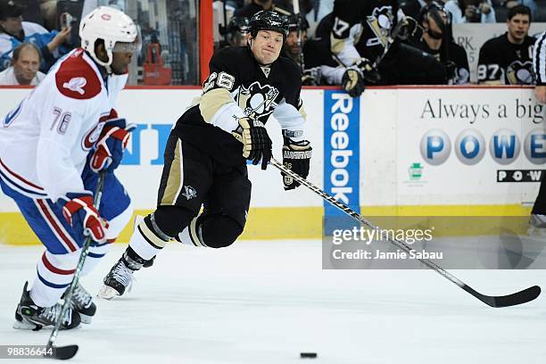 Ruslan Fedotenko of the Pittsburgh Penguins defends as PK Subban of the Montreal Canadiens skates with the puck in Game Two of the Eastern Conference...