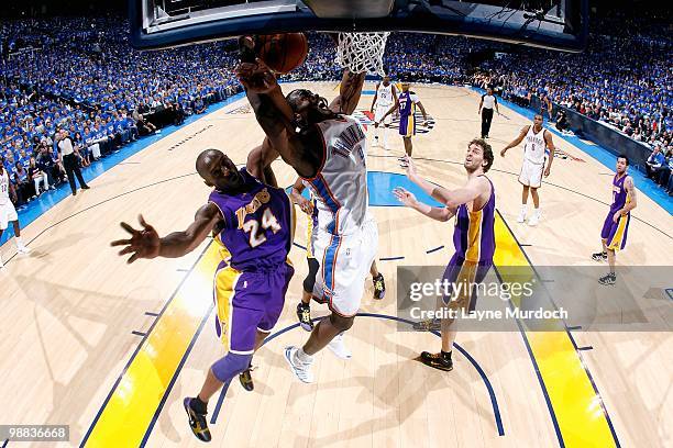 Serge Ibaka of the Oklahoma City Thunder goes to the basket against Kobe Bryant of the Los Angeles Lakers in Game Six of the Western Conference...