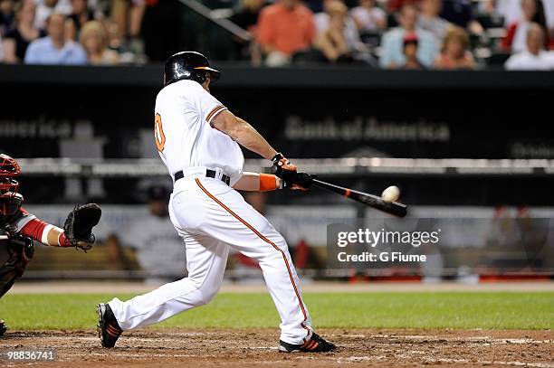 Luke Scott of the Baltimore Orioles bats against the Boston Red Sox at Camden Yards on May 1, 2010 in Baltimore, Maryland.