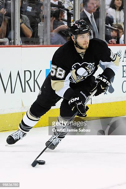 Kris Letang of the Pittsburgh Penguins skates with the puck against the Montreal Canadiens in Game Two of the Eastern Conference Semifinals during...