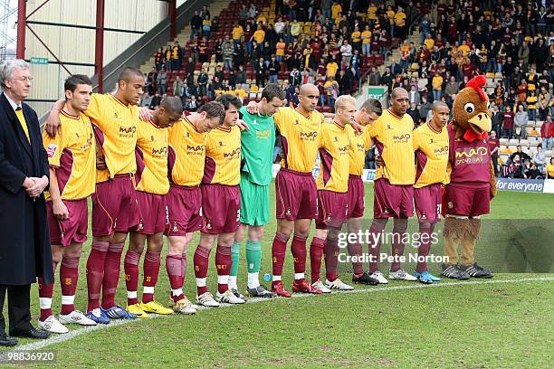 Bradford City players observe a minutes silence to mark the 25th anniversary of the 1985 Bradford Fire which claimed the lives of 56 supporters prior...