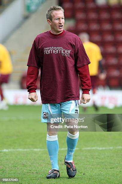 John Curtis of Northampton Town wears a tee shirt to commemorate the 25th anniversary of the 1985 Bradford Fire,which claimed 56 lives,during the...