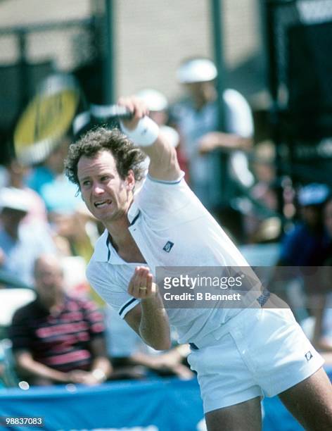 John McEnroe of the United States serves the ball during match play in the Hamlet Challenge Cup circa August 1986 in Long Island, New York.