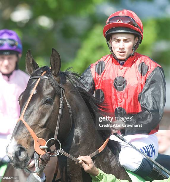 Dick Turpin and Ryan Moore at Newmarket racecourse on May 01, 2010 in Newmarket, England