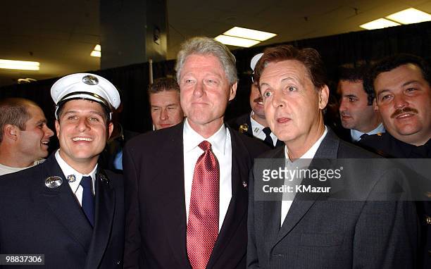 Bill Clinton and Paul McCartney with police officers