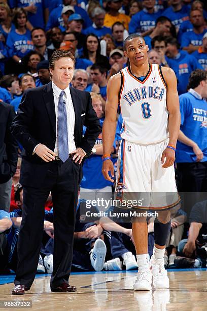 Head coach Scott Brooks and Russell Westbrook of the Oklahoma City Thunder stand on the court in Game Six of the Western Conference Quarterfinals...