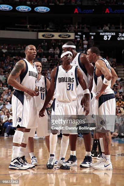 Caron Butler, Jose Barea, Jason Terry, Brendan Haywood and Shawn Marion of the Dallas Mavericks huddle on the court during the game against the San...