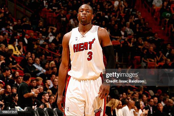 Dwyane Wade of the Miami Heat walks across the court in Game Three of the Eastern Conference Quarterfinals against the Boston Celtics during the 2010...