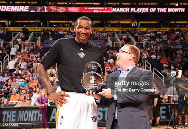 Amar'e Stoudemire of the Phoenix Suns is presented the Kia Western Conference Player of the Month Award for March by David Griffin, Phoenix Suns...