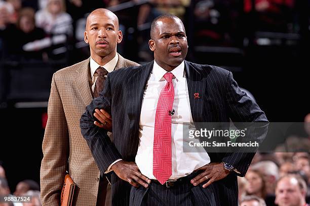 Assistant coach Monty Williams pulls back head coach Nate McMillan of the Portland Trail Blazers in Game Six of the Western Conference Quarterfinals...