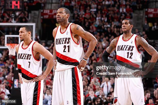 Brandon Roy, Marcus Camby and LaMarcus Aldridge of the Portland Trail Blazers stand on the court in Game Six of the Western Conference Quarterfinals...