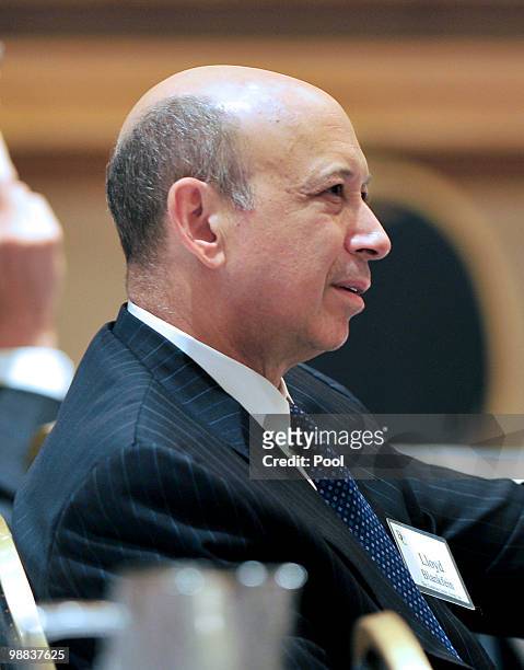 Lloyd Blankfein, Chairman and Chief Executive Officer, The Goldman Sachs Group, Inc. Listens as U.S. President Barack Obama delivers remarks to the...