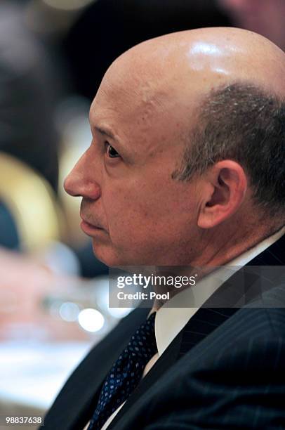 Lloyd Blankfein, Chairman and Chief Executive Officer, The Goldman Sachs Group, Inc. Listens as U.S. President Barack Obama delivers remarks to the...