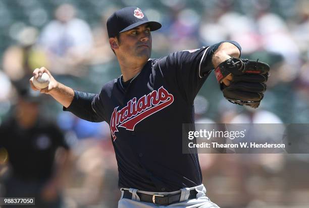 Adam Plutko of the Cleveland Indians pitches against the Oakland Athletics in the bottom of the first inning at Oakland Alameda Coliseum on June 30,...