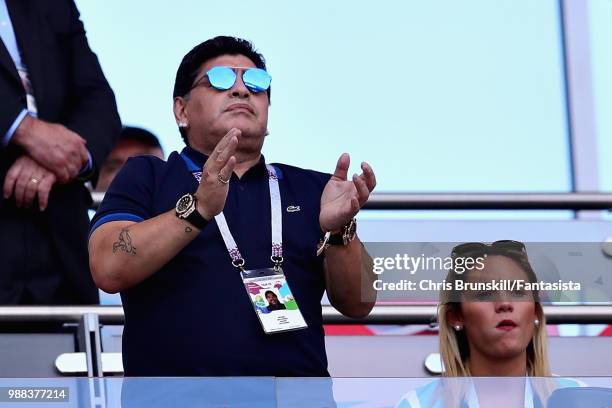 Former Argentina player and manager Diego Maradona looks on from the crowd during the 2018 FIFA World Cup Russia Round of 16 match between France and...