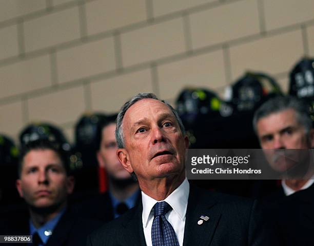 New York City Mayor Michael Bloomberg is joined by firefighters from New York's Engine Co. 54, Ladder Co. 4 and Battalion 9 for a press conference in...