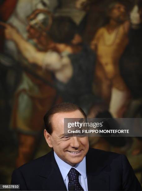 Italian Prime minister Silvio Berlusconi attends a joint press conference with the head of the Italian Civil Protection Guido Bertolaso and General...