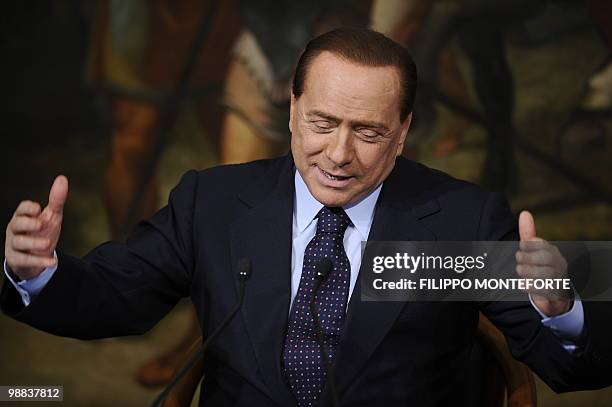 Italian Prime minister Silvio Berlusconi attends a joint press conference with the head of the Italian Civil Protection Guido Bertolaso and General...