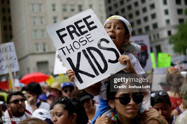 Demonstrators protest against Immigration and Customs Enforcement and the Trump administration's immigration policies at Daley Plaza, June 30, 2018...