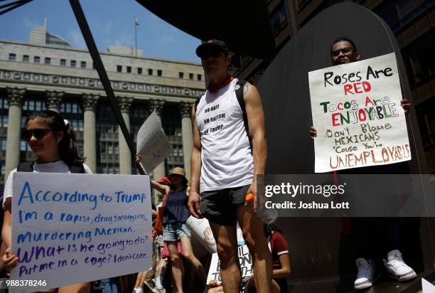 Demonstrators protest against Immigration and Customs Enforcement and the Trump administration's immigration policies at Daley Plaza, June 30, 2018...