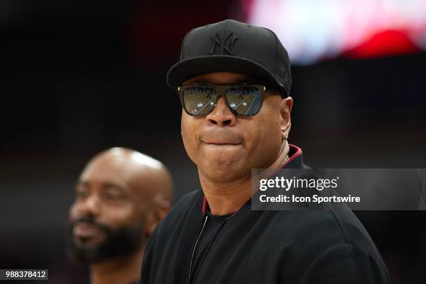 Rapper and entertainer LL Cool J looks on during a game in week two of the BIG3 three on three basketball league on June 29 at the United Center in...