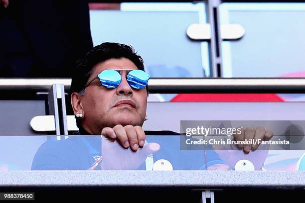 Former Argentina player and manager Diego Maradona looks on from the crowd during the 2018 FIFA World Cup Russia Round of 16 match between France and...