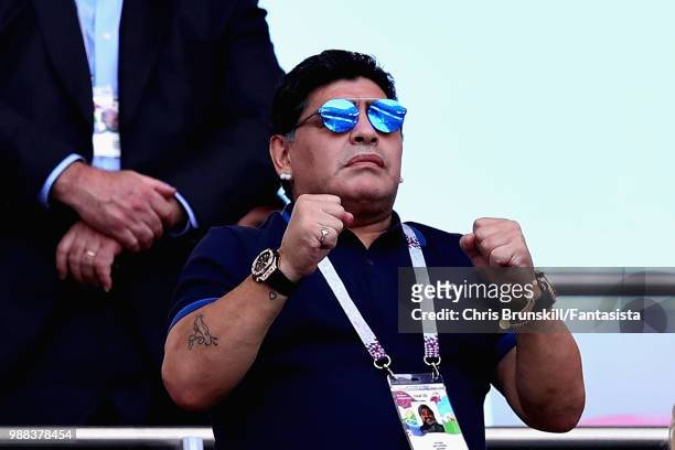Former Argentina player and manager Diego Maradona looks on from the crowd during the 2018 FIFA World Cup Russia Round of 16 match between France and...