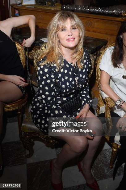 Emmanuelle Seigner attends Miu Miu 2019 Cruise Collection Show at Hotel Regina on June 30, 2018 in Paris, France.