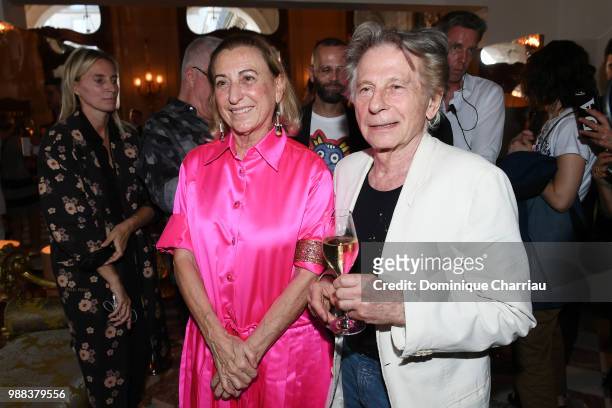 Miuccia Prada and Roman Polanski attend Miu Miu 2019 Cruise Collection Show at Hotel Regina on June 30, 2018 in Paris, France.