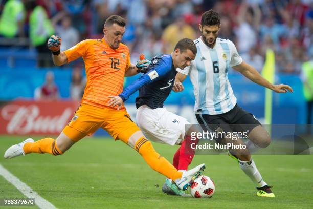 Federico Fazio of Argentina,Antoine Griezmann of France,Franco Armani of Argentina during the 2018 FIFA World Cup Russia Round of 16 match between...