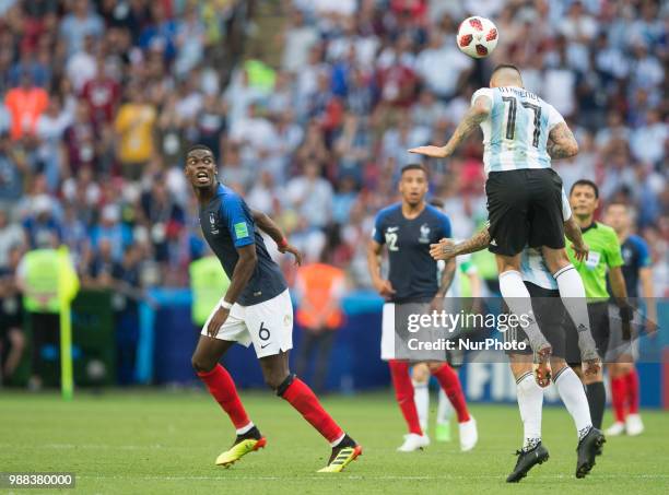 Paul Pogba of France vies Nicolas Otamendi of Argentina during the 2018 FIFA World Cup Russia Round of 16 match between France and Argentina at Kazan...