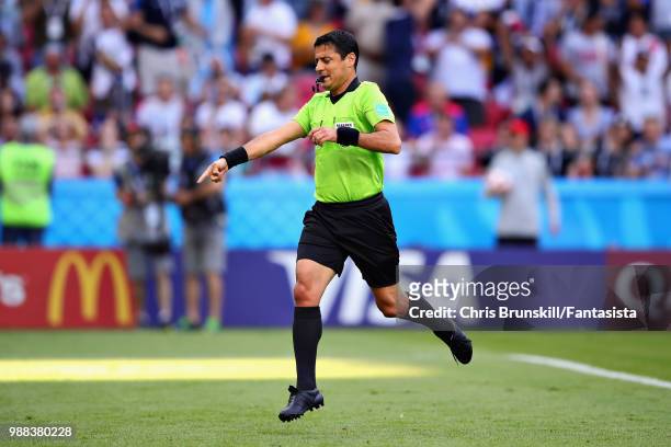 Referee Alireza Faghani gestures during the 2018 FIFA World Cup Russia Round of 16 match between France and Argentina at Kazan Arena on June 30, 2018...