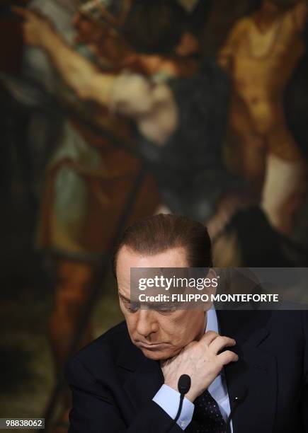 Italian Prime minister Silvio Berlusconi attends a joint press conference with the head of the Italian Civil Protection Guido Bertolaso and General...