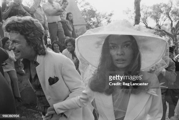 British photographer, Patrick Lichfield with Bianca Pérez-Mora Macías at her wedding to Mick Jagger in St Tropez, 12th May 1971.