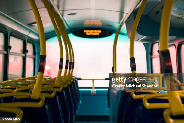 a bus ride in the rain - voertuiginterieur stockfoto's en -beelden