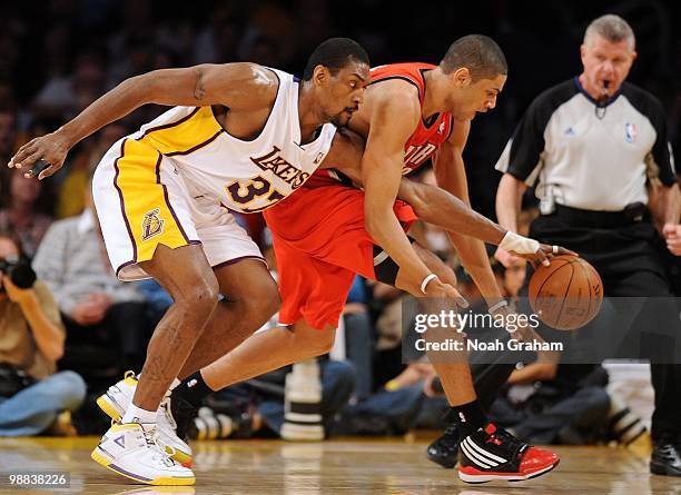 Ron Artest of the Los Angeles Lakers moves for the loose ball against Nicolas Batum of the Portland Trail Blazers during the game at Staples Center...