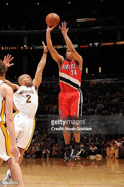Andre Miller of the Portland Trail Blazers makes a jumpshot against Derek Fisher of the Los Angeles Lakers during the game at Staples Center on April...