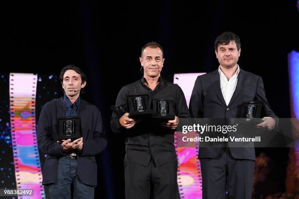 Marcello Fonte, Matteo Garrone and Edoardo Pesce are awarded during the Nastri D'Argento Award Ceremony on June 30, 2018 in Taormina, Italy.