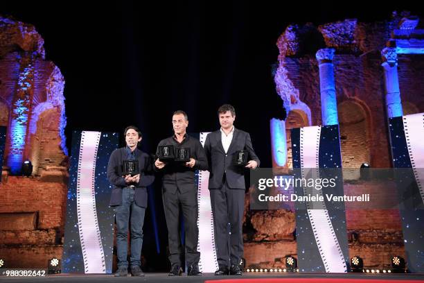 Marcello Fonte, Matteo Garrone and Edoardo Pesce are awarded during the Nastri D'Argento Award Ceremony on June 30, 2018 in Taormina, Italy.